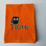 oranje handdoek met naam en tekening